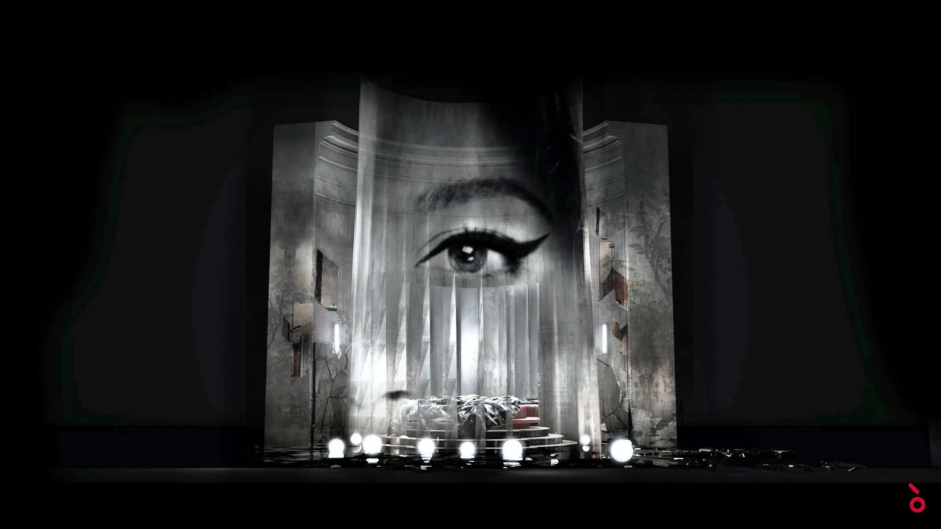 Render of the set: curved grey wall with a giant projected eye above a pile of furniture and footlights – La Traviata at Maggio Musicale Fiorentino, Florence, Italy, 2022 – opera set design