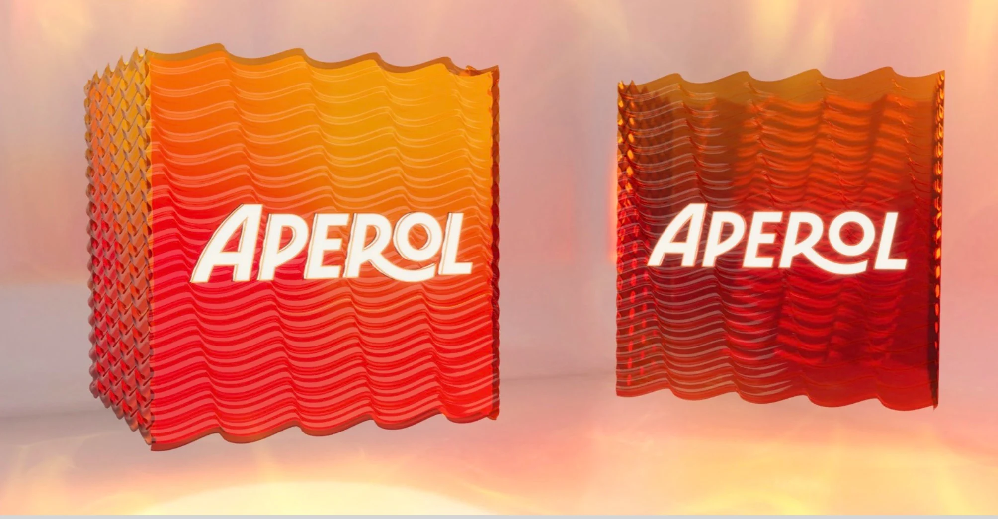 Render of two wavy-textured orange cubes with the Aperol logo – Aperol Tool Kit, 2023 – product design