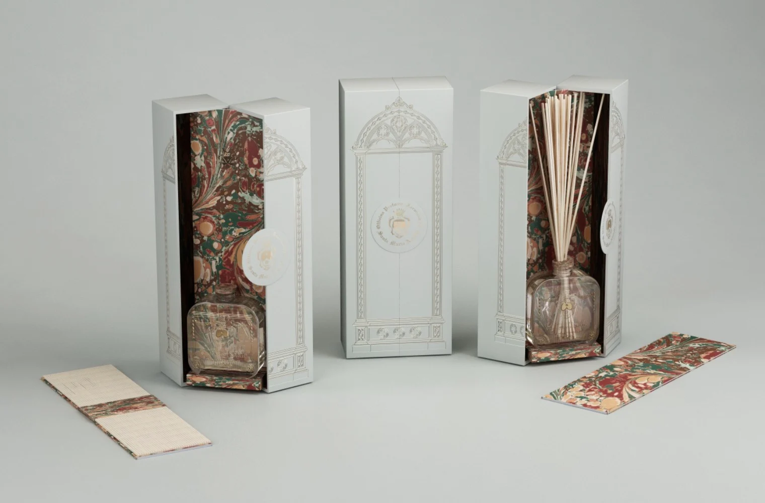 Render of pale grey diffuser boxes with arched door graphics, opened to show red-green marbled lining – Santa Maria Novella Home Fragrances, 2021 – graphic design proposal