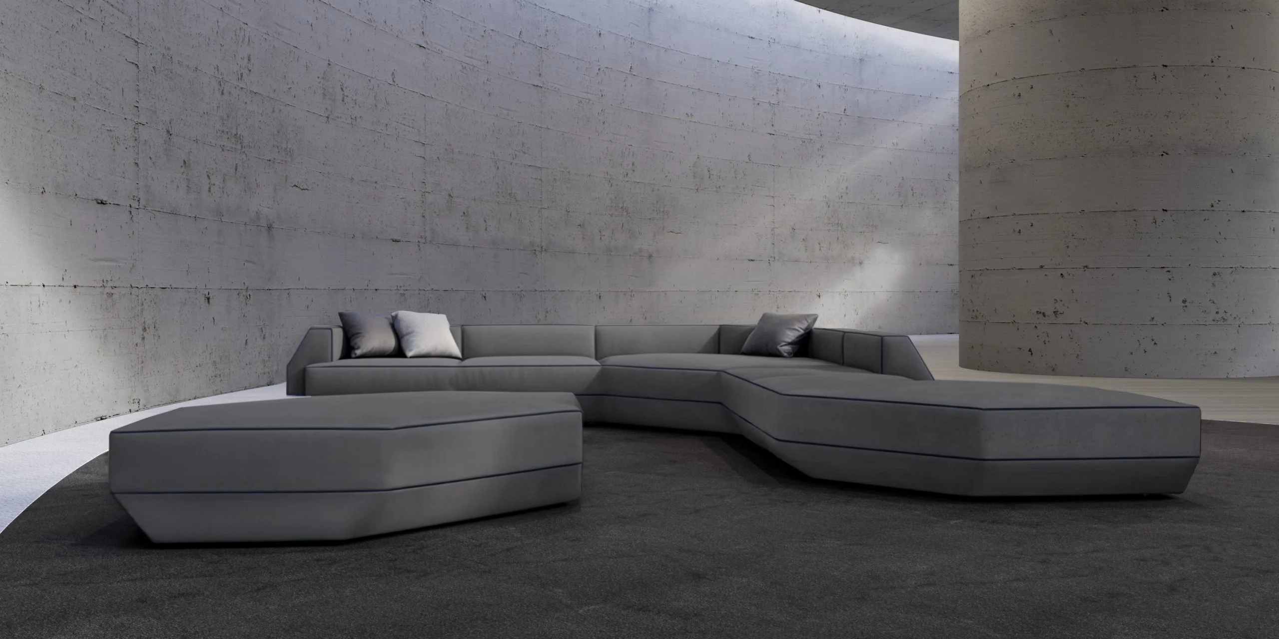 Grey modular sofa with faceted sections in a curved concrete space – Tonino Lamborghini FRAME Collection, Milan, Italy, 2025 – product design
