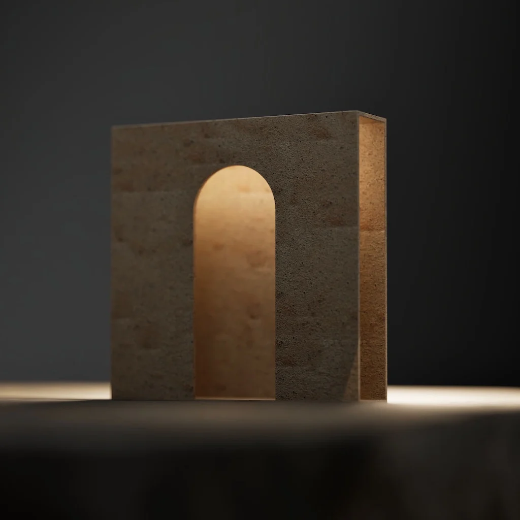 Stone block with an arched opening lit from within against a dark background – Porfido Pedretti Porphyry Furniture, Milan, Italy, 2025 – product design