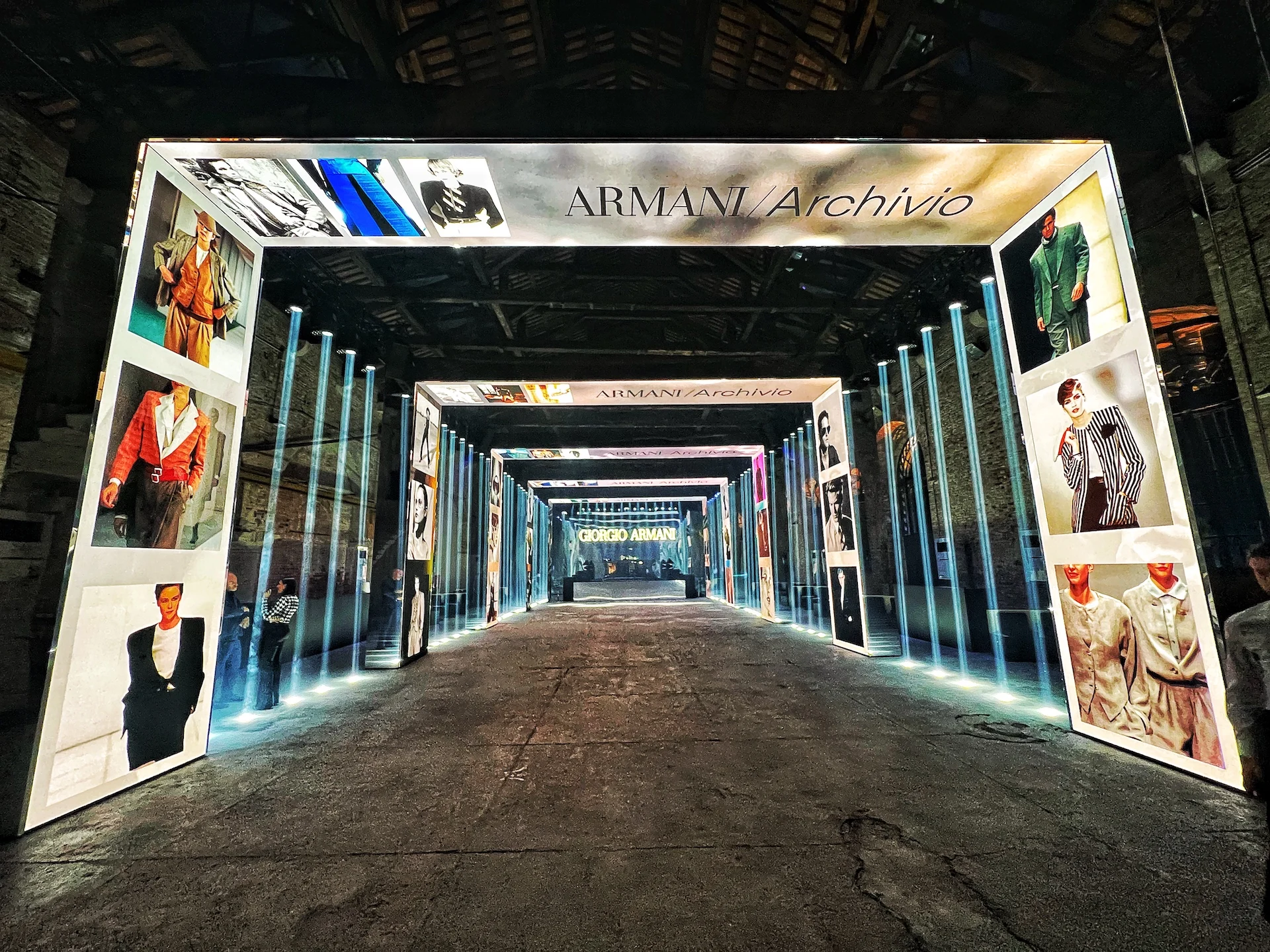 Corridor of LED portals in the Arsenale hall, the first titled Armani/Archivio and lined with archive images – Armani/Archivio Party at Venice Film Festival, Italy, 2025 – event design
