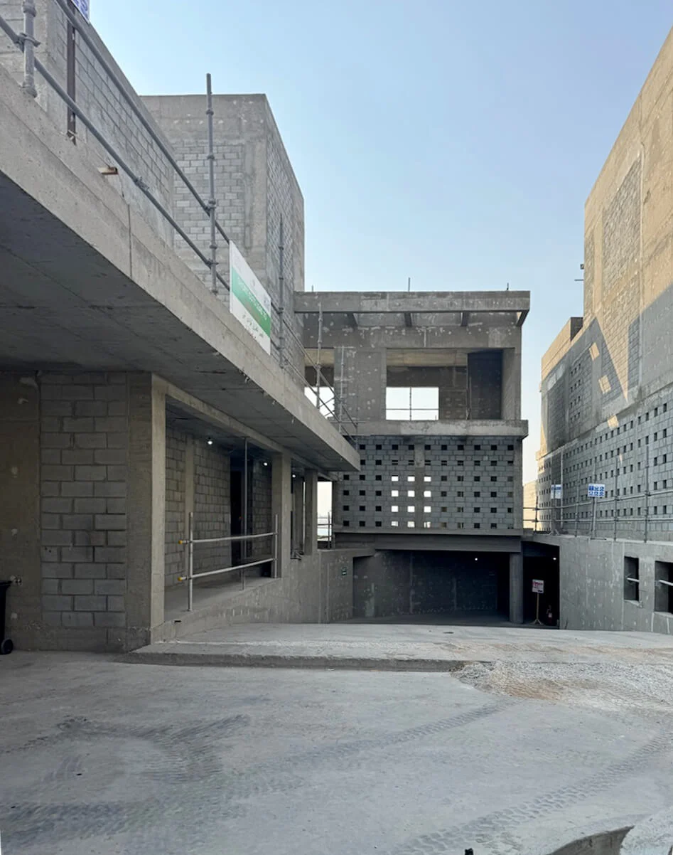 Villa under construction: bare concrete floors, block walls and perforated block screens – Radic Residences, Jeddah, Saudi Arabia, 2025 – architecture, under construction